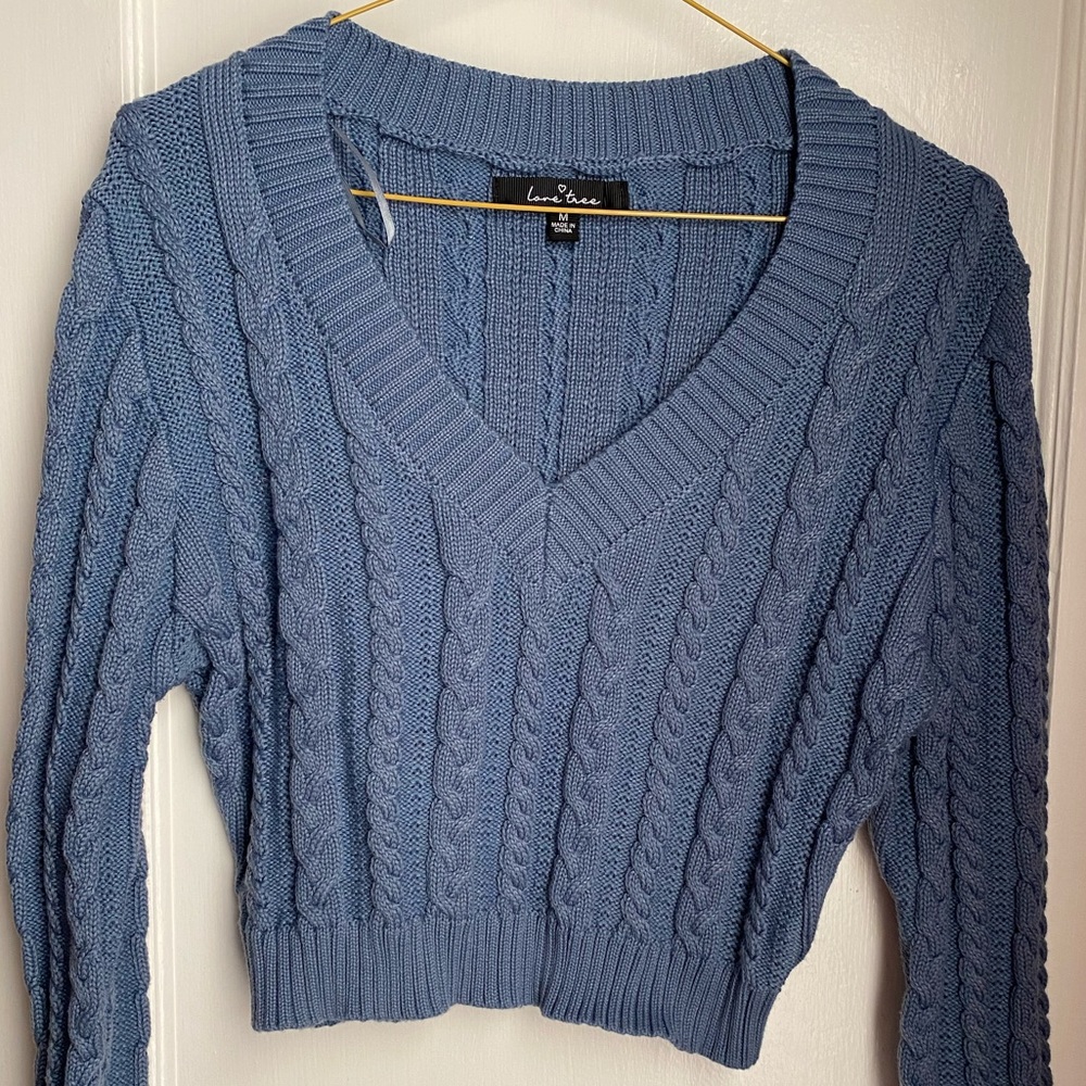 Cropped blue v-neck sweater